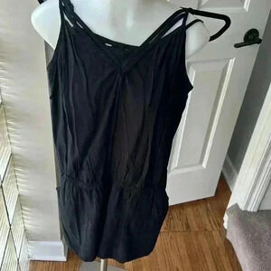 Size M Black Flowy short romper with pockets from Express